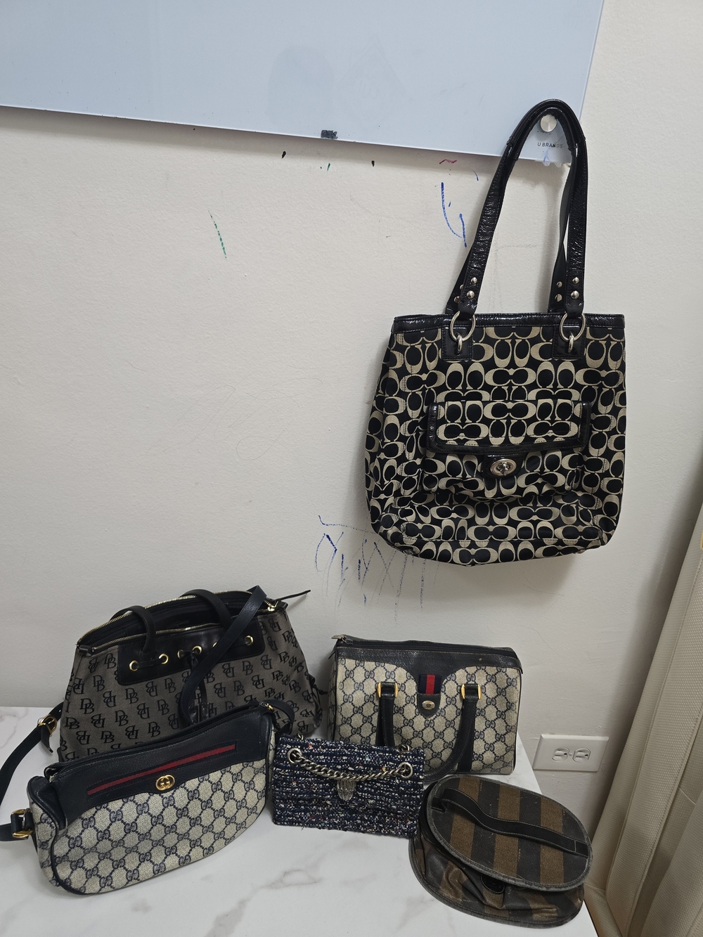 Gucci Coach Fendi Kurt Geiger Dooney & Bourke